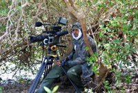Yusuf Thakur filming with Red One in 2011, fully covered to protect against the Noseum bug 2